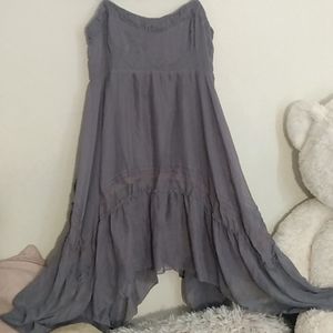 Soft classic Teddy top. Beautiful ruffles,  flowing side drapes.